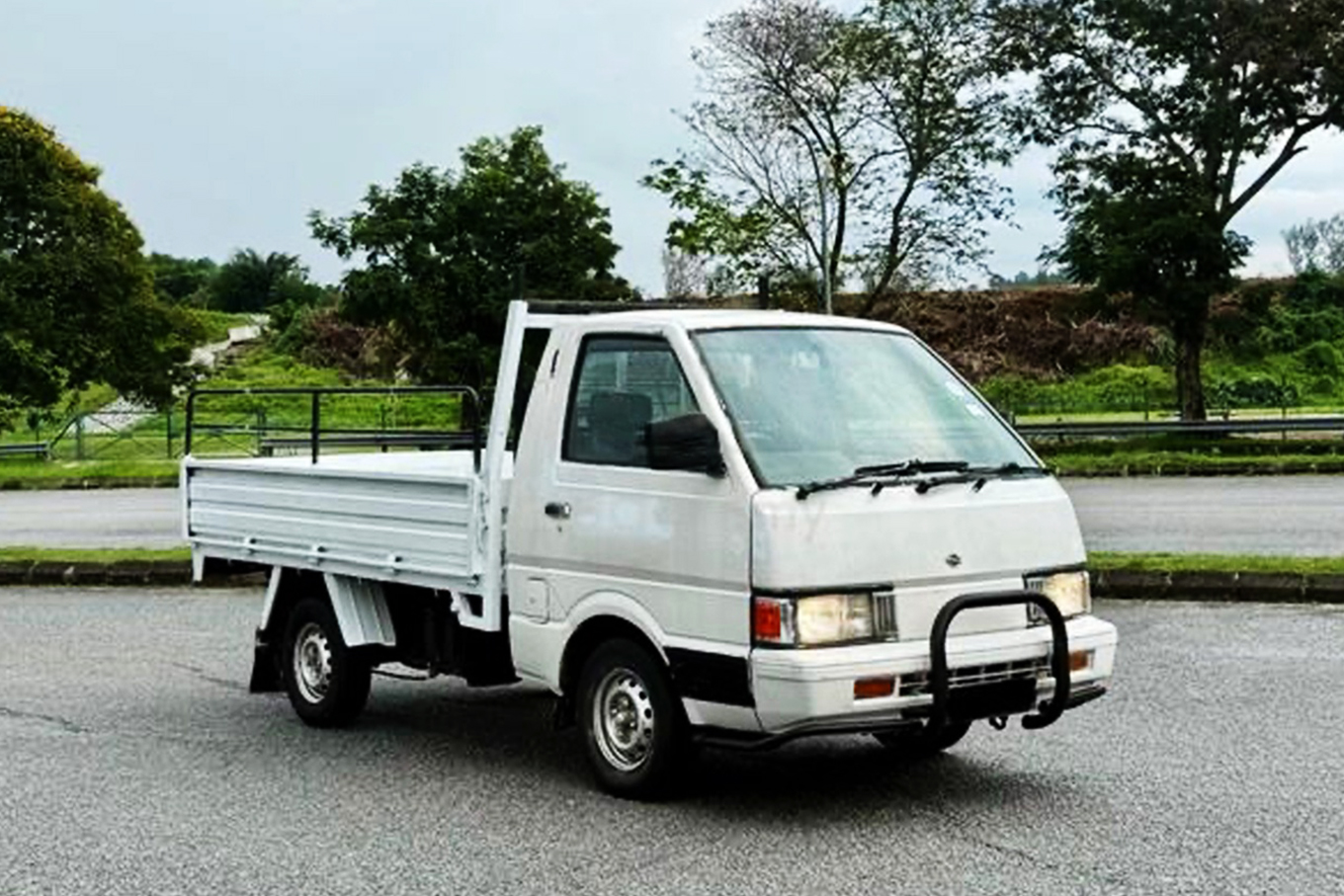 An old diesel mini truck that costs more to repair and run, the kind a business might replace